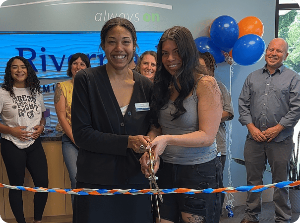 Parenting With Intents ribbon cutting at a Rivermark branch.